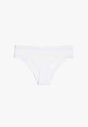 Ropa interior femenina de bikini blanca sin costuras, con tejido liso y cinturilla elástica, presentada extendida sobre un fondo blanco liso.