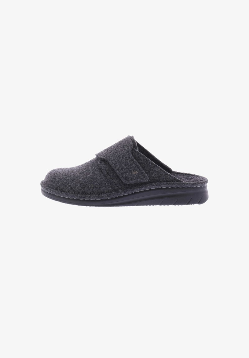 Gray felt slipper with adjustable strap, black rubber sole, rounded toe, and visible stitching along the edge, designed for comfort.