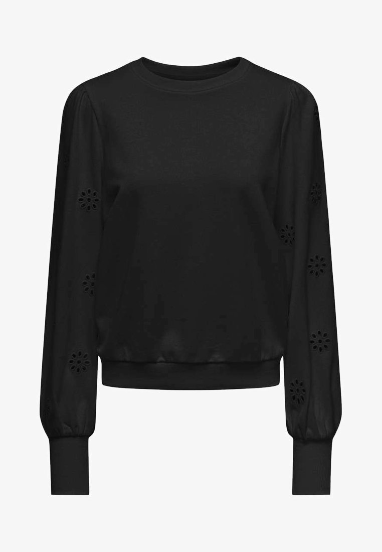 Svart genser med lange ermer som har blomsterutskjæringer på ermene, rund hals og ribbestrikket kant. Glatt stofftekstur.