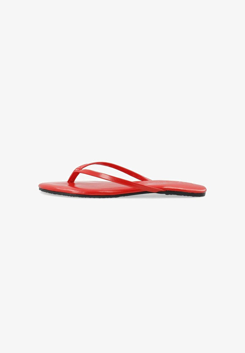 Red flip-flop sandal with two thin straps and a smooth surface, featuring a flat sole and textured black bottom for grip.
