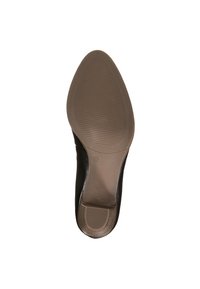 Black shoe sole with textured rubber surface, curved shape, and a small heel. Features a smooth finish and a logo near the heel area.