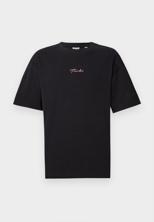 Black short-sleeve crew neck t-shirt with small red cursive text "Turbo" centered on the chest against a plain light background.