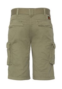 Pantaloni cargo verde oliva realizzati in cotone con un tessuto testurizzato. Presentano quattro tasche e una cintura intrecciata. Il bordo è rifinito in modo conciso.