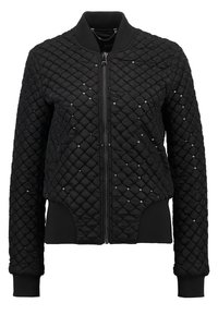 Czarna, pikowana kurtka bomberka z zamkiem błyskawicznym i ściągaczami. Ozdobiona cekinami dla dodatkowego efektu. Gładka tekstura, lekka konstrukcja.