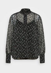 Zwarte doorzichtige blouse met een herhalend pijlpatroon in grijs en wit, met een hoge hals en ballonmouwen, knoopsluiting achter.