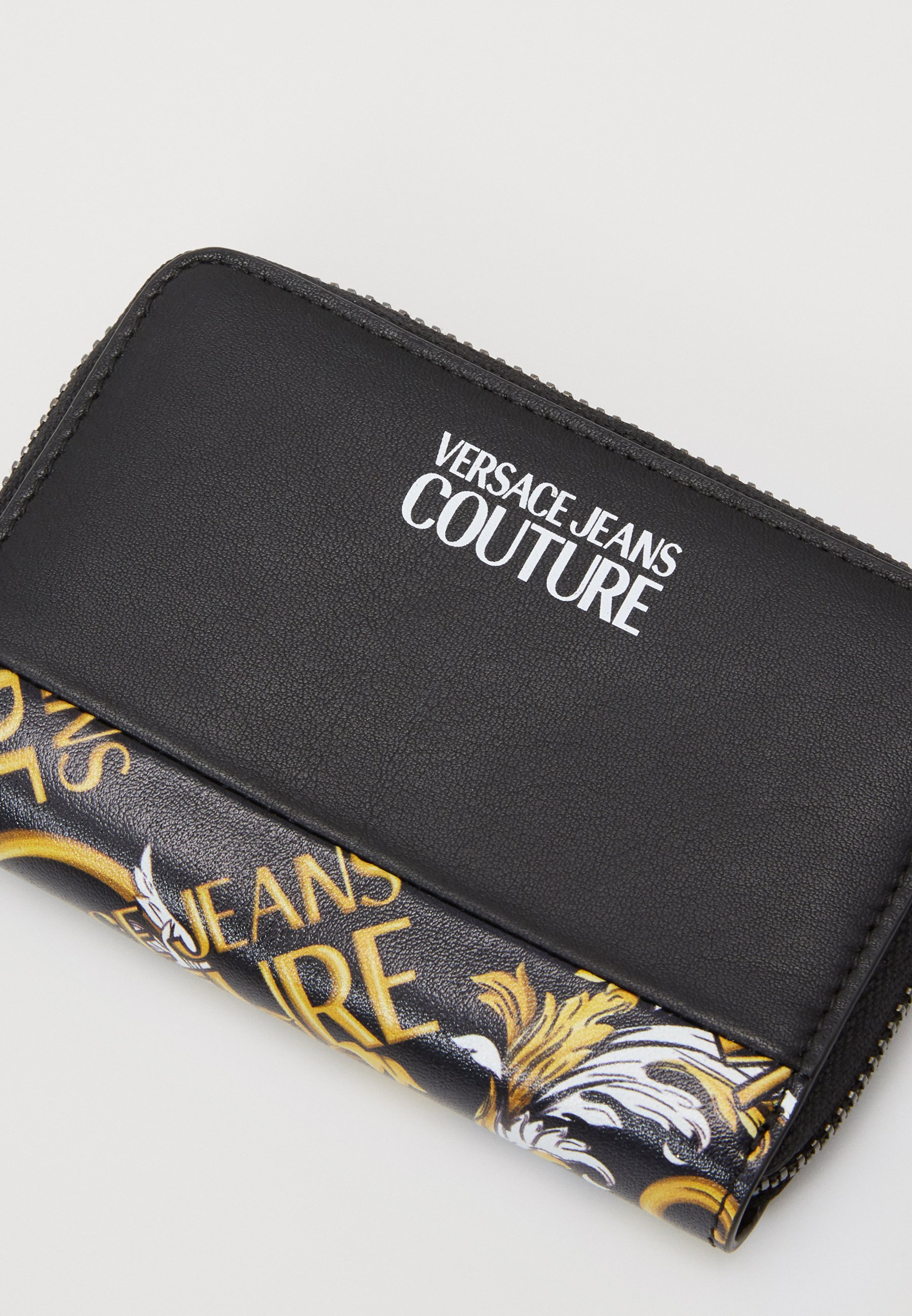 Versace Jeans Couture Lommebok blackgoldsvart Zalando.no Black STIVALETTO | Versace Jeans Couture | Vintersko | Miinto.no