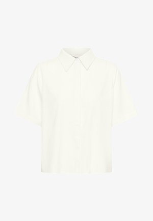 Cămașă albă cu mâneci scurte și nasturi, cu guler ascuțit, prezentând o croială lejeră și dreptunghiulară și un design curat, minimal.