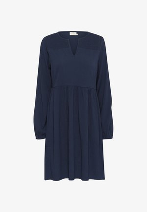 Navy blue dress with long sleeves, V-neckline, gathered waist, and textured bodice. Flowing fabric and slightly A-line shape.