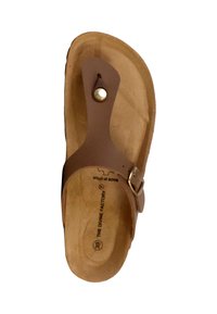 Sandale marron avec une semelle intérieure en liège texturée, sangle ajustable et boucle en métal. Conçue pour le confort, elle présente un style minimaliste et un design à bout ouvert.