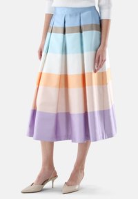 Pleated midi skirt in multicolor stripes (blue, white, orange, lavender). Made of smooth fabric with a fitted waistband and flowing design.