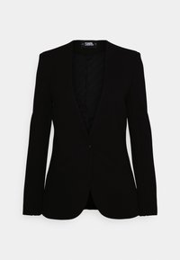 Černý blazer s jedním knoflíkem, ostrými klopami a dlouhými rukávy. Materiál vypadá hladce s jemnou texturou a přiléhavým střihem.