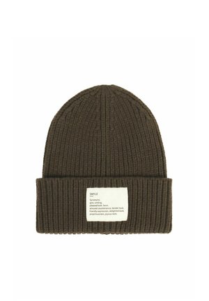 Dark brown ribbed knit beanie with folded cuff and white rectangular patch displaying text about the word "smyle" and its synonyms.