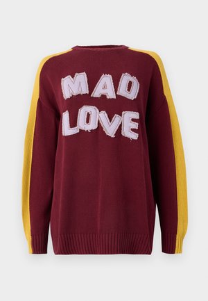Knitted sweater in burgundy with yellow shoulder stripes. Features "MAD LOVE" in textured, stitched letters. Ribbed cuffs and hem.