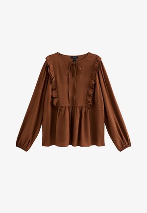 Bruine blouse met lange mouwen en een gestructureerde stof, met ruches langs de halslijn en aan de zijkanten, en een strikdetail bij de kraag.