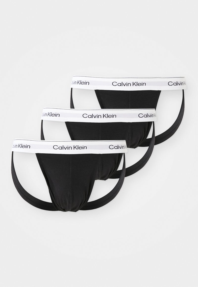 Svart bomullsboxer med en hvit elastisk midjebånd med "Calvin Klein"-logo, designet i en tettsittende stil med minimale sømmer.