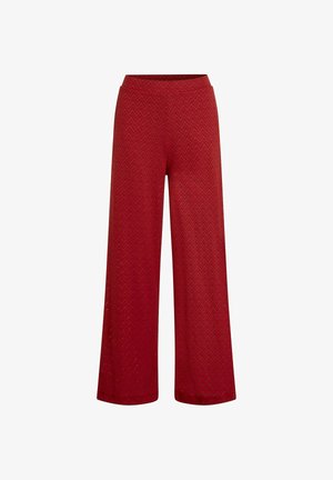 Rdeče široke hlače z vzorcem cikcak, mehkim elastičnim pasom in ohlapnim krojem za udobje.