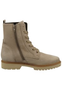 Stivale alla caviglia in pelle beige con lacci e zip laterale, caratterizzato da una finitura testurizzata e una suola in gomma con scanalature per una migliore aderenza.