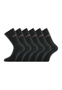 Six chaussettes de travail noires avec le logo FILA en blanc et rouge sur le bord, disposées côte à côte sur un fond blanc.