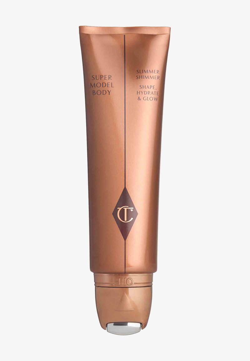 Shimmering bronze tube labeled "Super Model Body Slimmer Shimmer," with an applicator tip designed for shaping, hydrating, and glowing skin.