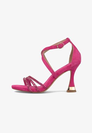 Rosa Wildleder-High-Heel-Sandale mit drei perlenbesetzten Vorderfußriemen, gekreuztem Knöchelriemen mit goldener Schnalle und ausgestelltem Absatz mit goldenen Akzenten.
