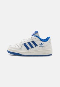 White leather sneakers with blue accents, featuring three striped designs, a padded collar, rubber sole, and perforated detailing on the toe.
