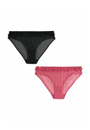 Svarta och rosa trosor med genomskinligt tyg, prickigt mönster och volangmidjor. Det svarta paret är placerat ovanpå det rosa paret.