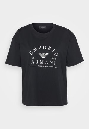 Schwarzes Baumwoll-T-Shirt mit Rundhalsausschnitt, kurzen Ärmeln und einem weißen Emporio Armani Logo sowie einem Adler-Graphic, die über die Vorderseite gedruckt sind.
