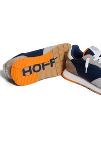 Navy and gray athletic shoes with white laces, orange accents, and textured soles displaying "HOFF" in bold lettering.