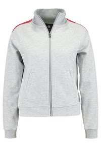 Gray zip-up hoodie with a high collar, featuring red accents on shoulders, side pockets, and ribbed cuffs. Smooth fabric texture.