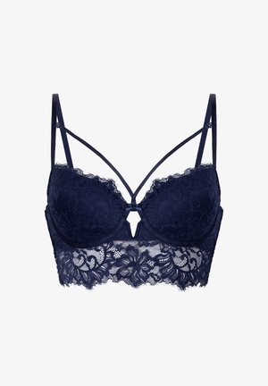Marine blauwe kanten bh met bloemmotief, onderwire ondersteuning, decoratieve sleutelgatdetails en verstelbare schouderbanden. Golvende randen verbeteren het ontwerp.