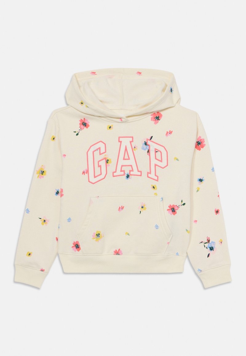 Sweat à capuche couleur crème avec les lettres "GAP" en rose et de petits motifs floraux dispersés en rose, jaune et bleu, poche kangourou à l'avant et capuche.