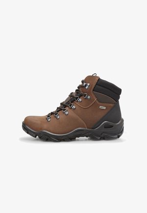 Scarponi da trekking mid-top in pelle marrone con accenti neri, dotati di occhielli in metallo, lacci resistenti e suola in gomma testurizzata.