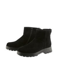 Schwarze Wildleder-Ankleboots mit runder Zehenpartie, seitlichen Reißverschlüssen und strukturierten Gummi-Außensohlen. Mit einem Blockabsatz in mittlerer Höhe.