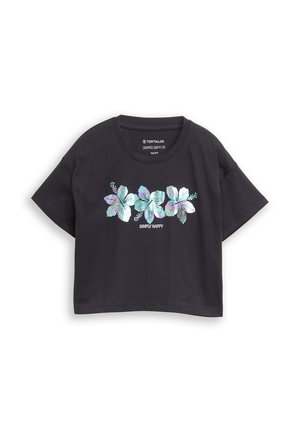 Black cropped T-shirt with three iridescent floral prints and "SIMPLY HAPPY" text centered below the flowers.