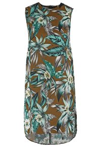 Bezrukávové šaty z hnědé látky s tropickým vzorem, který obsahuje zelené listy a bílé květy. Postranní rozparky pro pohodlný pohyb.