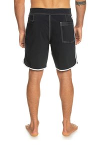 Black swimming shorts with white contrasting stitching, curved hem, and side stripes. Features a back pocket on the right side.