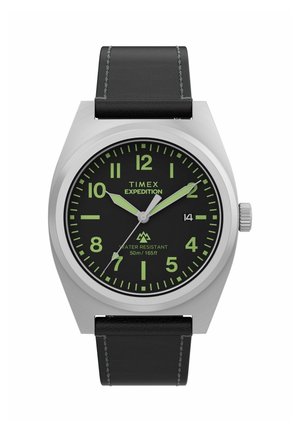 Reloj de pulsera Timex Expedition con esfera negra, números luminiscentes verdes, caja plateada, correa de cuero negra y pantalla de fecha a las 3 en punto.