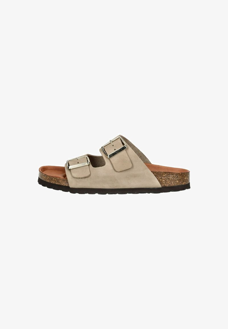 Suède sandalen in lichtbeige met twee verstelbare zilveren gespen. Korken voetbed en een gestructureerde rubberen loopzool voor verbeterde grip.