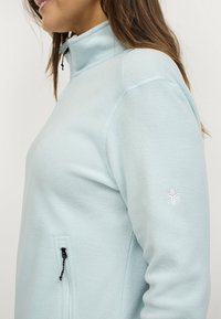 Áhkká Fleece jacket - hellblau