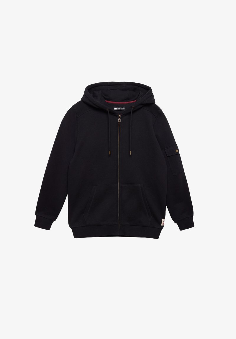 Sudadera con cremallera negra hecha de tela suave. Cuenta con capucha con cordón, bolsillos frontales y un bolsillo en la manga con botón. Corte clásico.