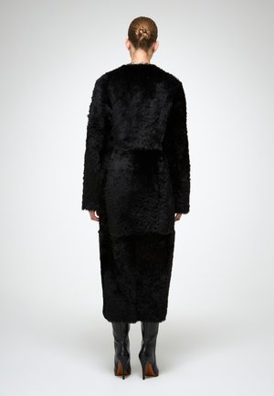 Rankning 2: VSP - INESSE - Vinterkappa /-rock