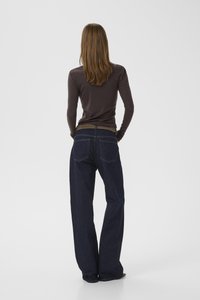 Dark blue wide-leg jeans with a high waist, featuring a contrasting khaki waistband, back pockets, and a smooth denim texture.