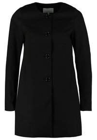 Mustan pitkähihaisen takin pyöreä pääntie ja neljä suurta nappia edessä, jossa on kaksi sivutaskua ja suora leikkaus.