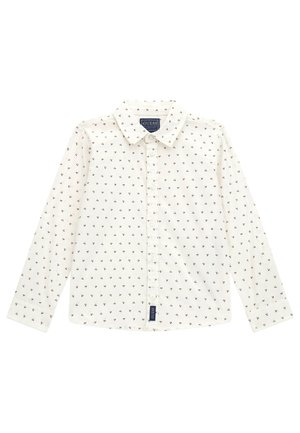 Camicia bianca con maniche lunghe, caratterizzata da un motivo di piccoli triangoli rossi. Include un colletto classico e un'etichetta con il marchio sull'orlo.