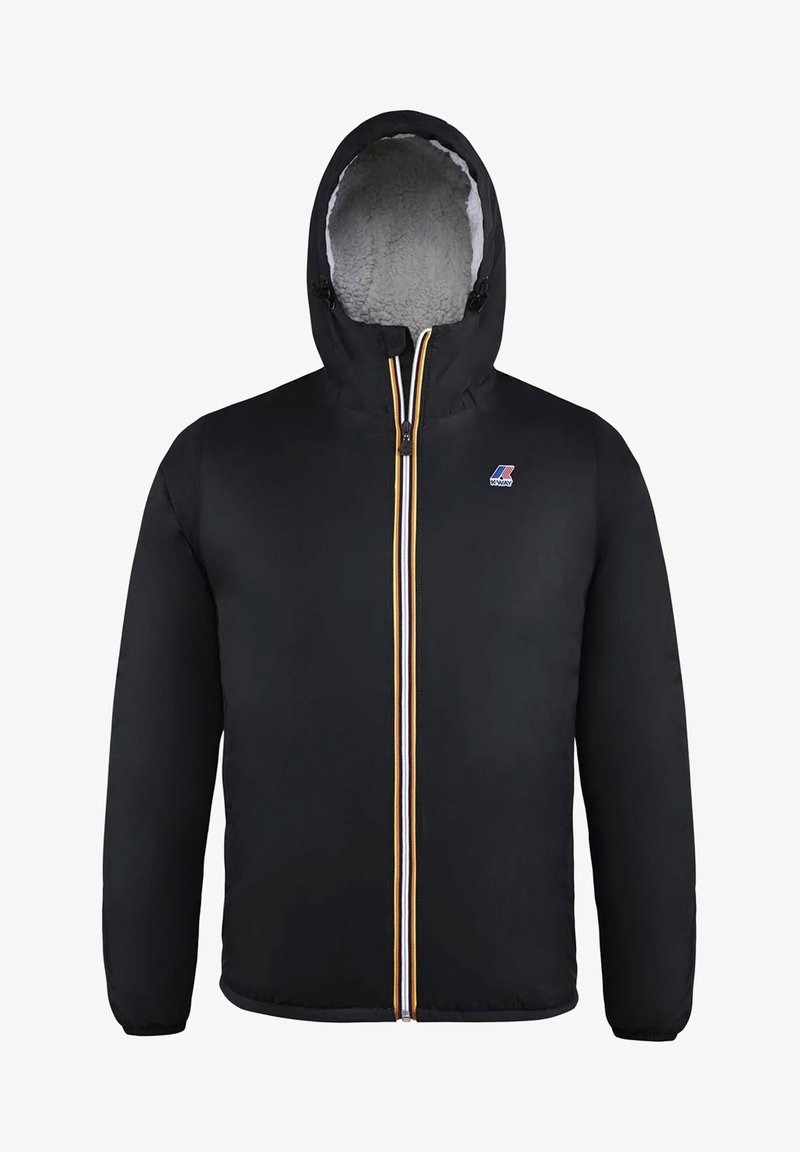 Veste à capuche noire avec doublure en polaire blanche, fermeture éclair frontale avec bordure tricolore et petit logo sur la poitrine, présentée sur fond blanc.