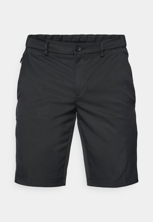 Bermudes noires en tissu lisse, dotées d'une fermeture à bouton, de passants de ceinture et d'une coupe droite. L'ourlet est soigneusement fini.