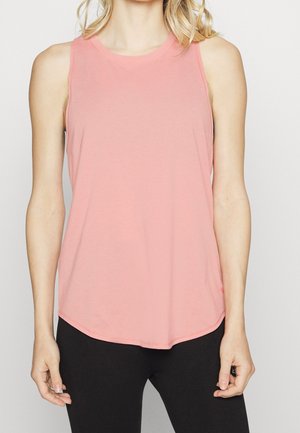 Vaaleanpunainen ilmanhiha tanktoppi, jossa on pyöreä helma ja hienovaraiset ompeluyksityiskohdat, valmistettu pehmeästä kankaasta, yhdistettynä mustiin legginsseihin.