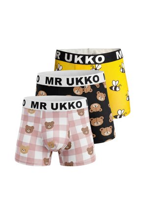 Three pairs of boxer shorts with "MR UKKO" waistbands, featuring patterns of bees on yellow, brown bears on black, and bears on pink and white checks.