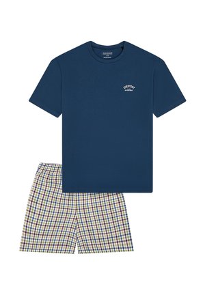 Navy cotton t-shirt with a white curved logo and plaid shorts featuring green, blue, yellow, and purple check patterns. Elastic waistband.