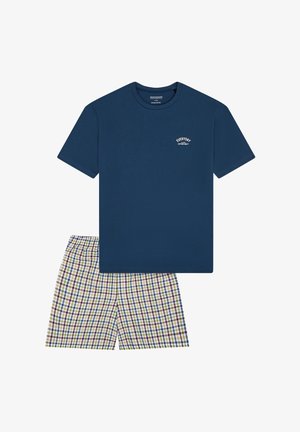Marineblauw katoenen T-shirt met een wit gebogen logo en geruite korte broek met groene, blauwe, gele en paarse ruitpatronen. Elastische tailleband.